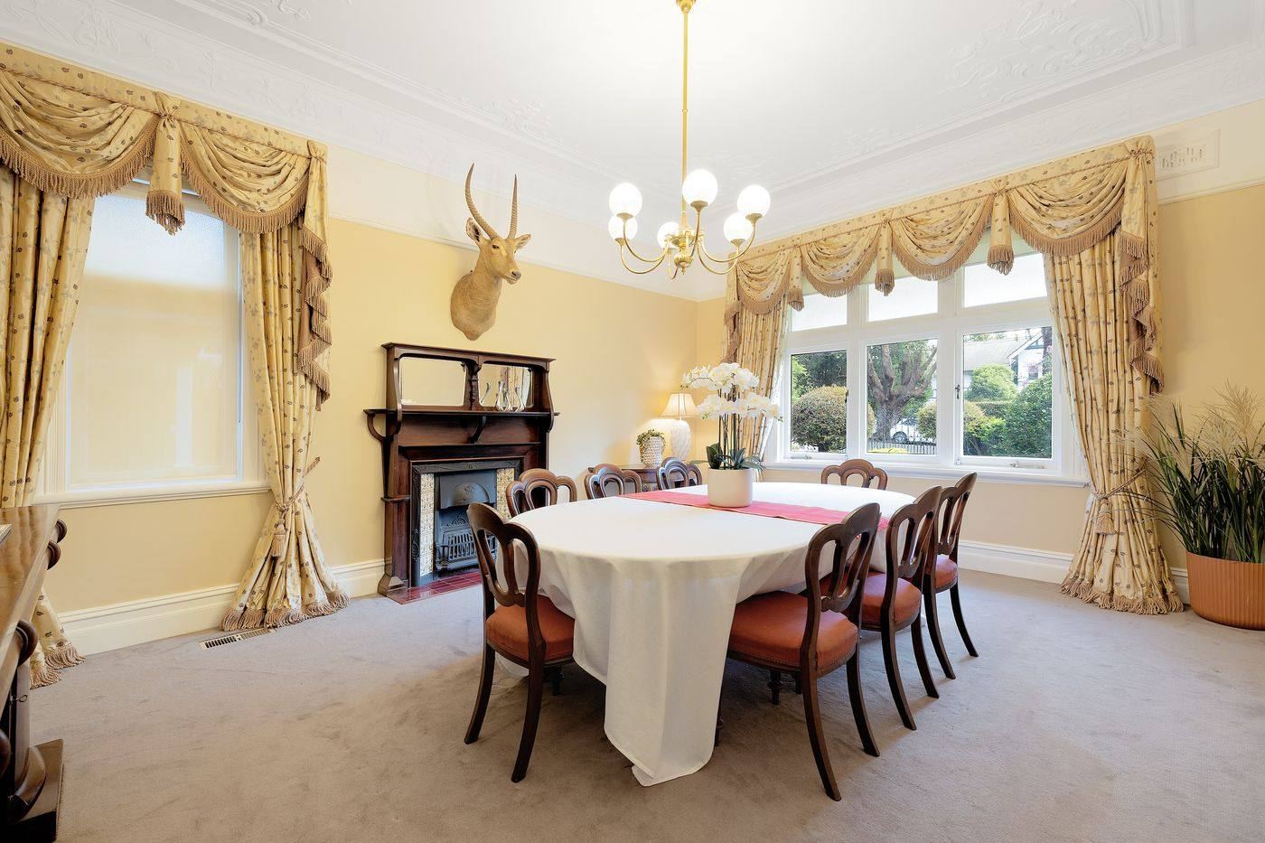 Formal dining room with bay window
