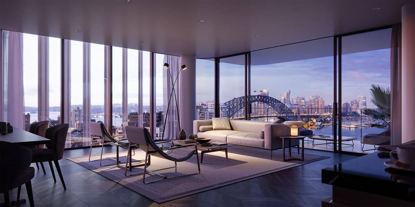 Living room with floor-to-ceiling glass framing the Harbour Bridge