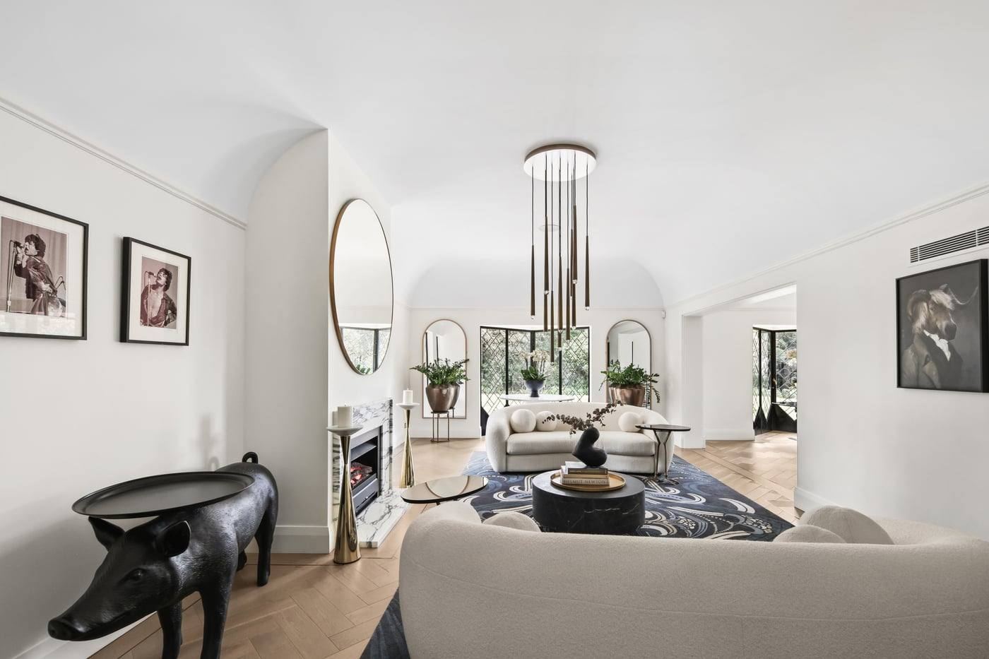 Formal living room with fireplace and garden outlook