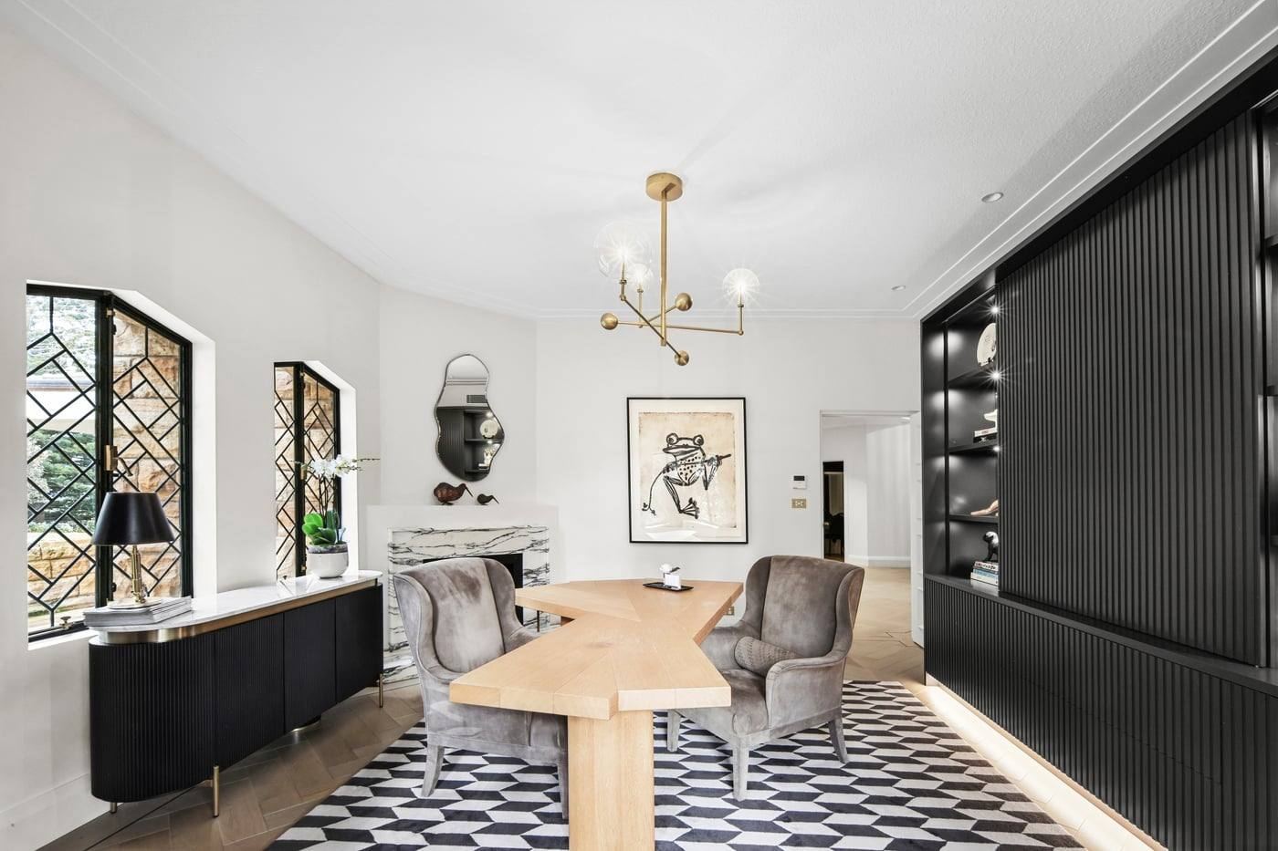 Dining room with chequerboard floor and custom cabinetry
