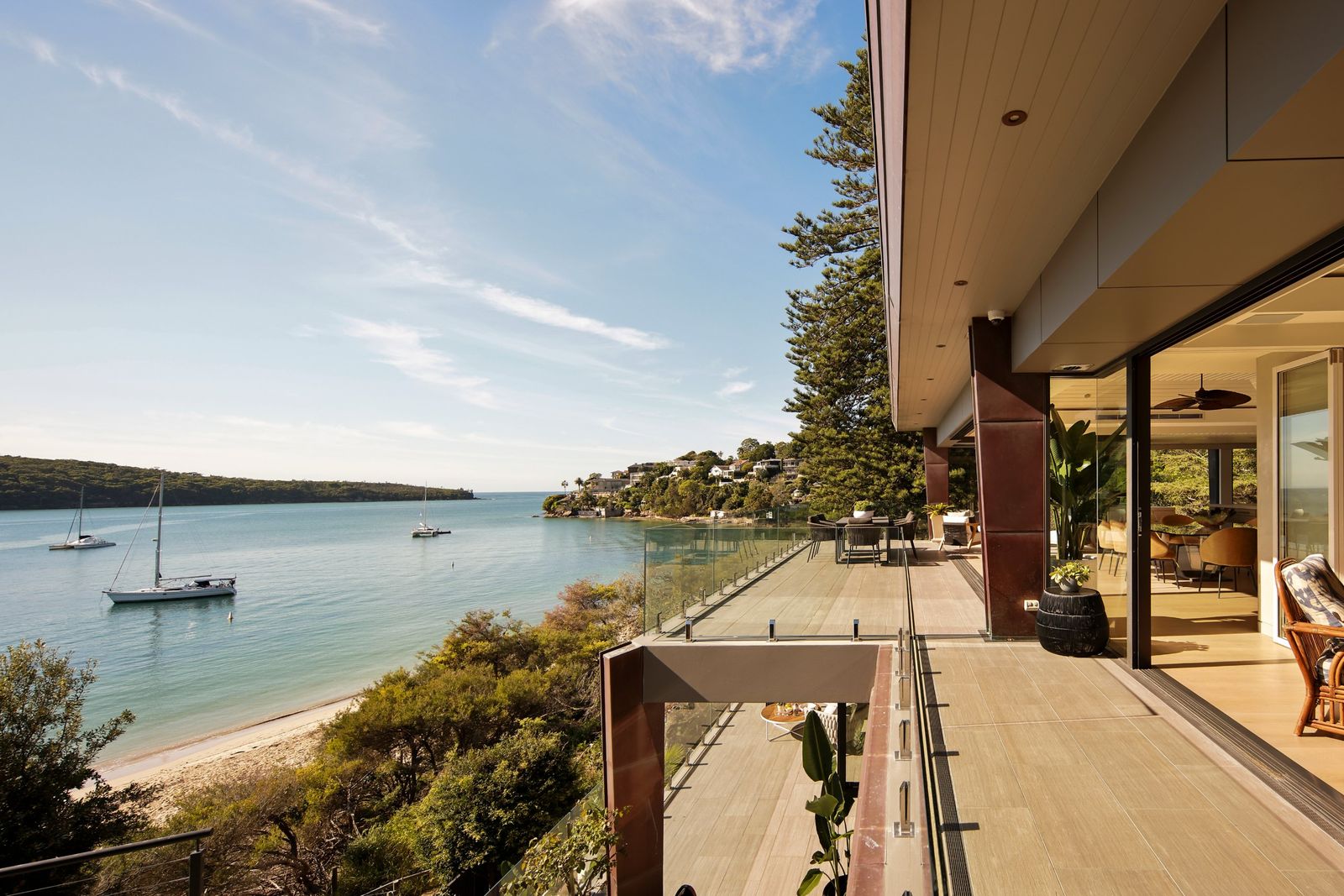 Harbour view from the terrace of a private Mosman residence, with yachts moored in the bay